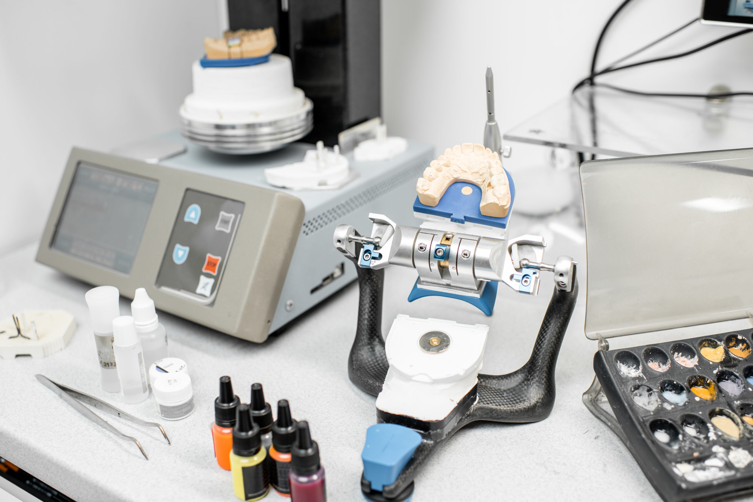 Professional oven with artificial jaw, baking enamel dentures at the laboratory